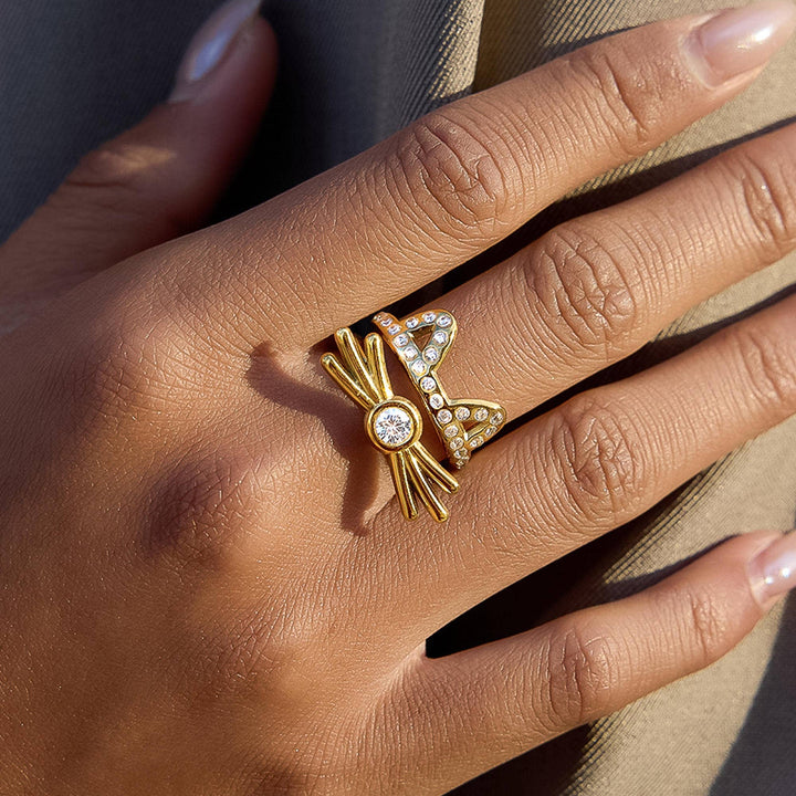 Gold ring with a diamond on a person&
