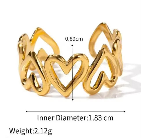 Gold heart-shaped open ring band with overlaid dimension labels showing inner diameter 1.83 cm, height 0.