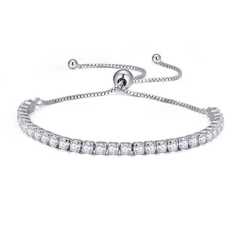 A silver-tone adjustable bracelet featuring a row of clear cubic zirconia stones across the front, displayed on a clean white background.