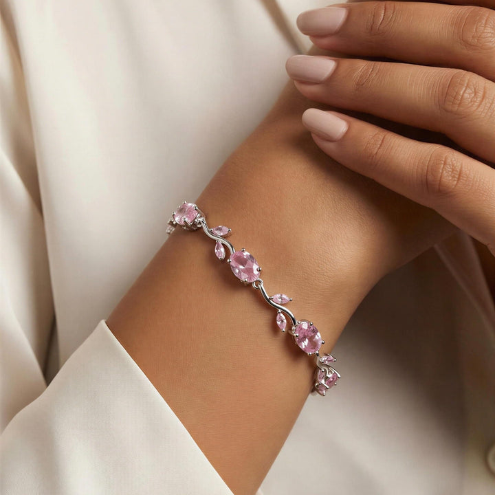 Tulip Bracelet with pink gemstones on a person&