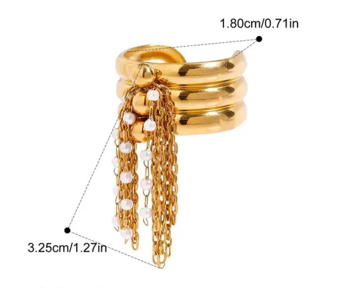 Gold-toned multi-band ring with dangling chains and pearl-like beads, shown on a white background with measurement callouts indicating 1.80 cm width and 3.