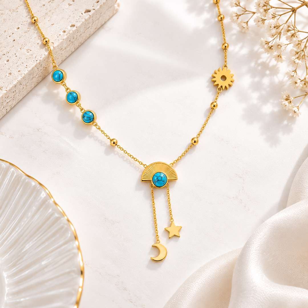 Dreamy Moon Star Mystic Necklace in gold with turquoise stones, sun charm and fan pendant with dangling moon and star drops