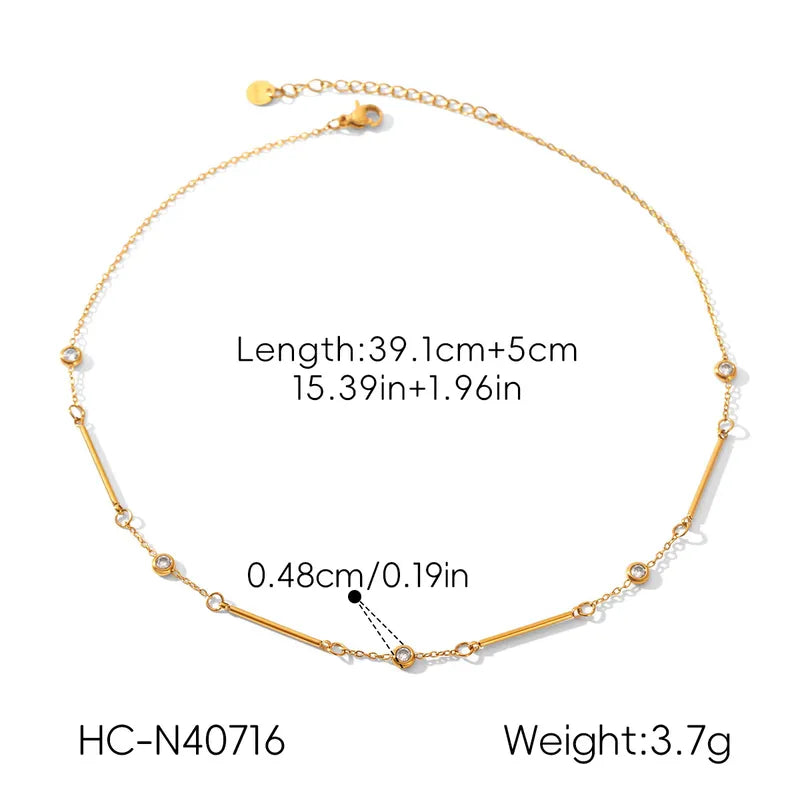 Gold chain necklace with a central straight bar and small bead accents, shown on a white background with printed measurements and weight information.