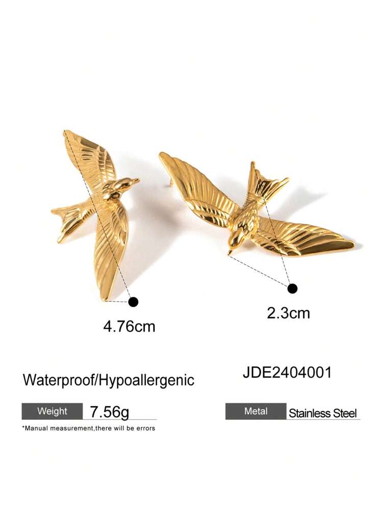 Two gold-colored swallow-shaped earrings shown on a white background with measurement annotations, weight 7.56g, stainless steel material, and product code JDE2404001.
