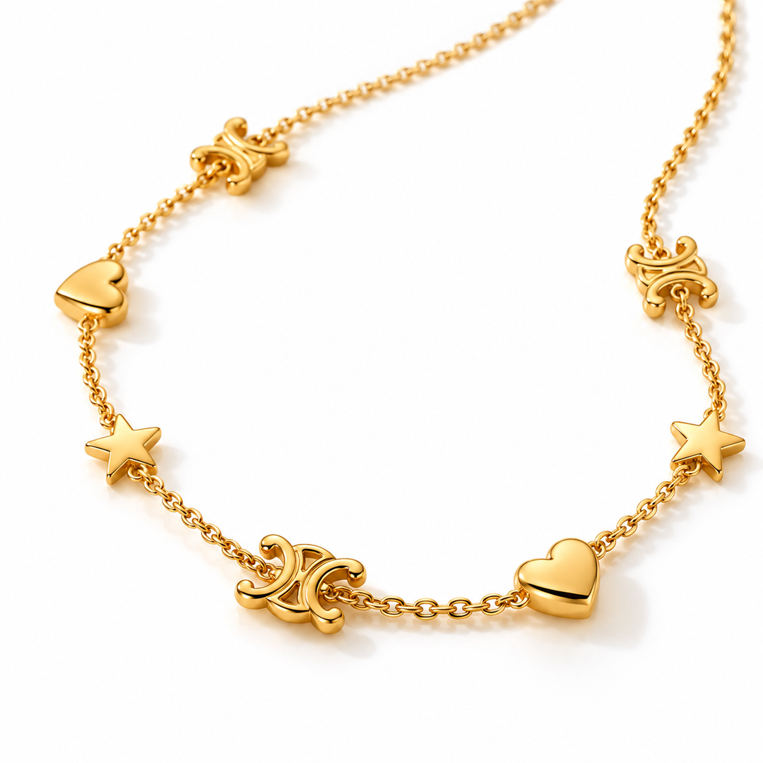 A gold chain necklace featuring alternating heart and star charms, with decorative scrollwork links, displayed on a clean white background.