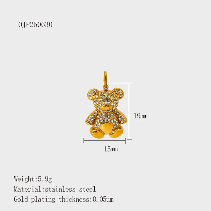 Gold-plated stainless steel teddy bear pendant covered with clear rhinestones, shown with dimension markings of 15mm width and 19mm height on a light gray background, with product specifications listed below.