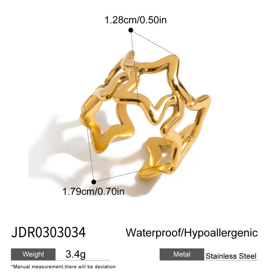 Gold-colored stainless steel star-shaped ring with dimension annotations showing 1.28cm/0.