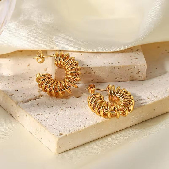Golden Twirl Hoop Earrings
