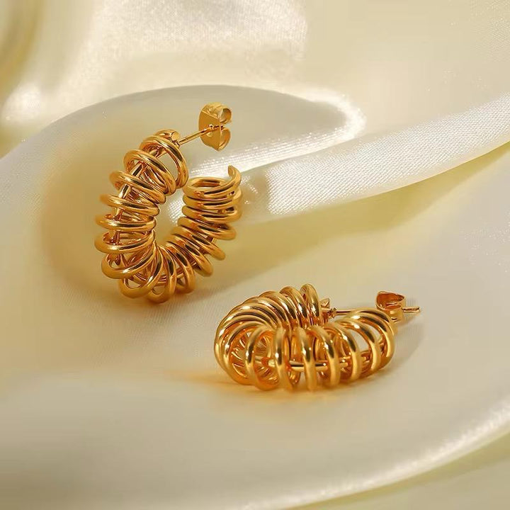 Golden Twirl Hoop Earrings