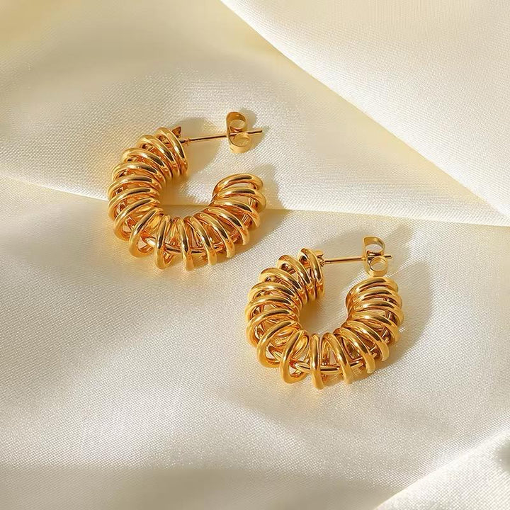 Golden Twirl Hoop Earrings