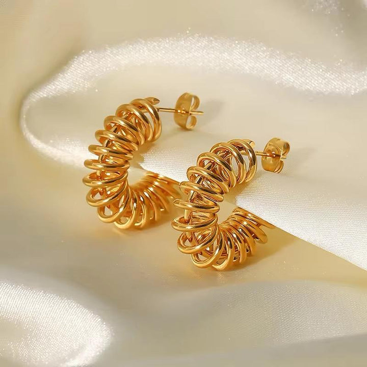 Golden Twirl Hoop Earrings