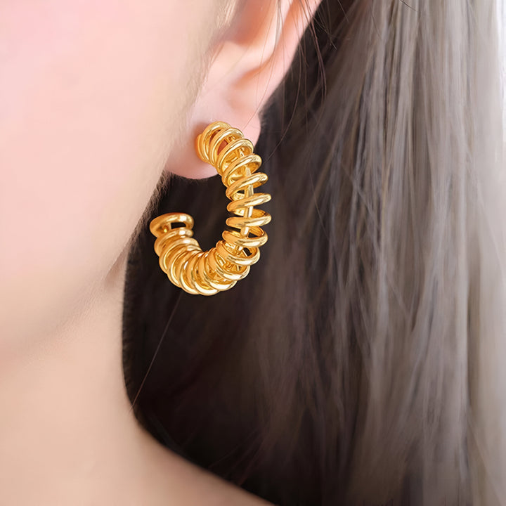 Golden Twirl Hoop Earrings